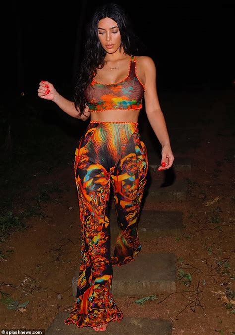 Kim Kardashian Flaunts Hourglass Curves In Vivid Dress
