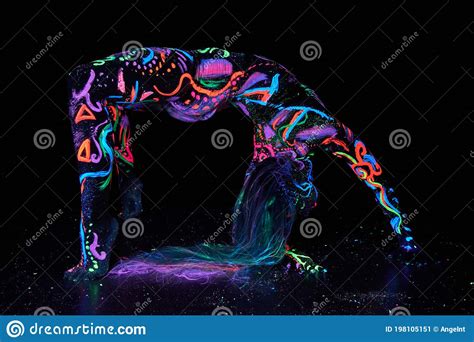 Art Woman Body Art On The Body Dancing In Ultraviolet Light Bright