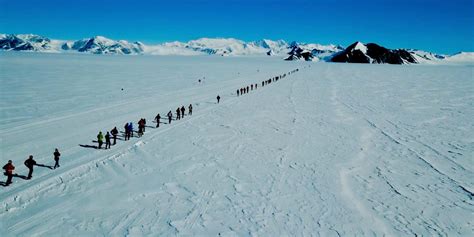 cinematic footage  antarctic ice marathon captured  drone video