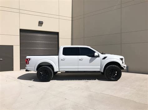 white lifted ford   boasts contrasting black additions caridcom gallery