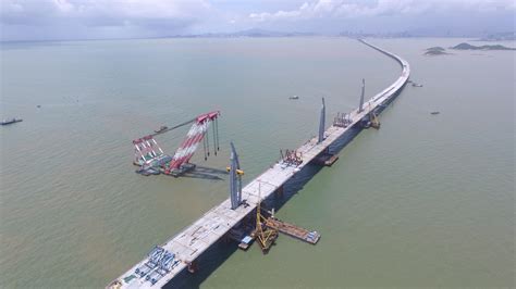 china  open mega bridge  tunnel  miles   water weku