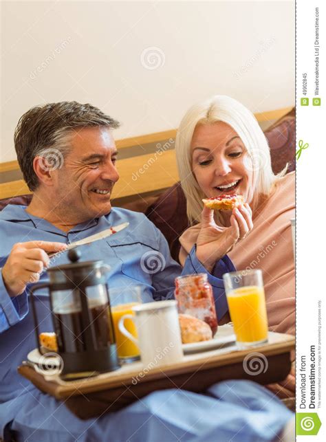 Happy Mature Couple Having Breakfast In Bed Stock Image Image Of