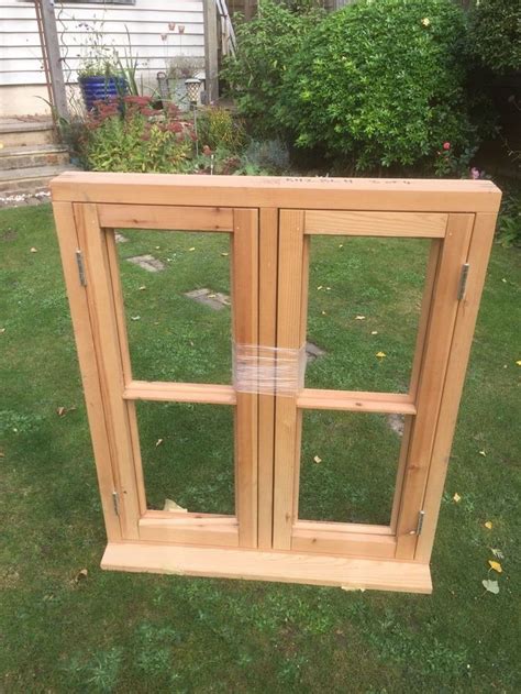 wooden casement window   bought  time       kitchen