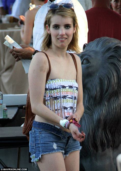 emma roberts strips down to a tube top and tiny shorts as