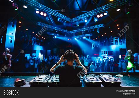 dj  headphones  night club party   blue light stock photo