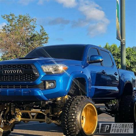 lifted toyota tacoma truck powder coated rims  transparent gold