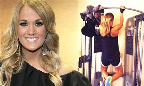 Carrie Underwood Shows Off Very Toned Arms During Intense Pull Up