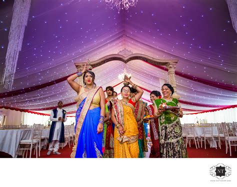 welcoming groom  barat  indian asian wedding photographers