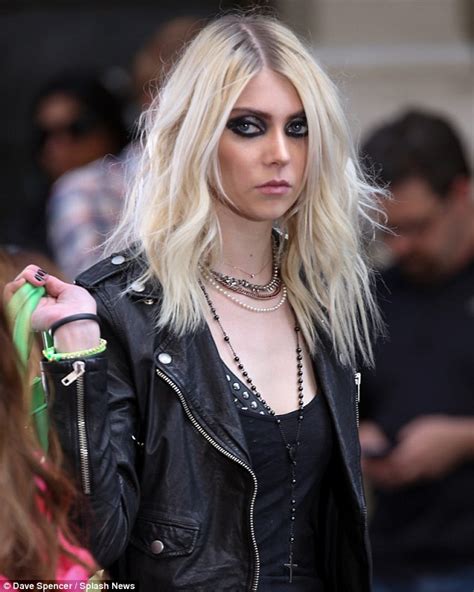 taylor momsen puts her cleavage and never ending legs on display as she