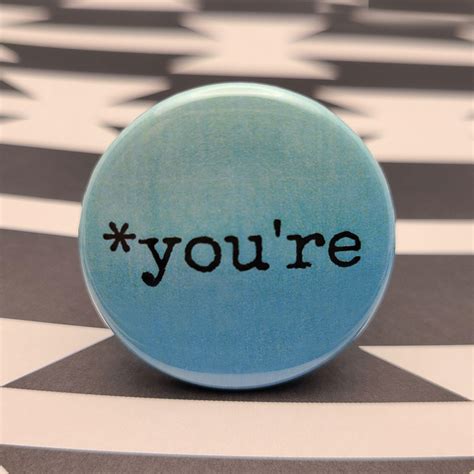 youre  pinback button badge  magnet