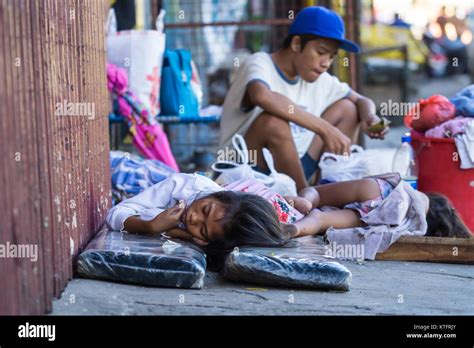 cebu city philippines  dec  homeless people   stock