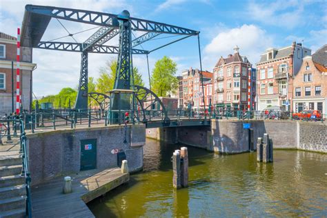 canal  amsterdam  netherlands jigsaw puzzle  bridges puzzles  thejigsawpuzzlescom