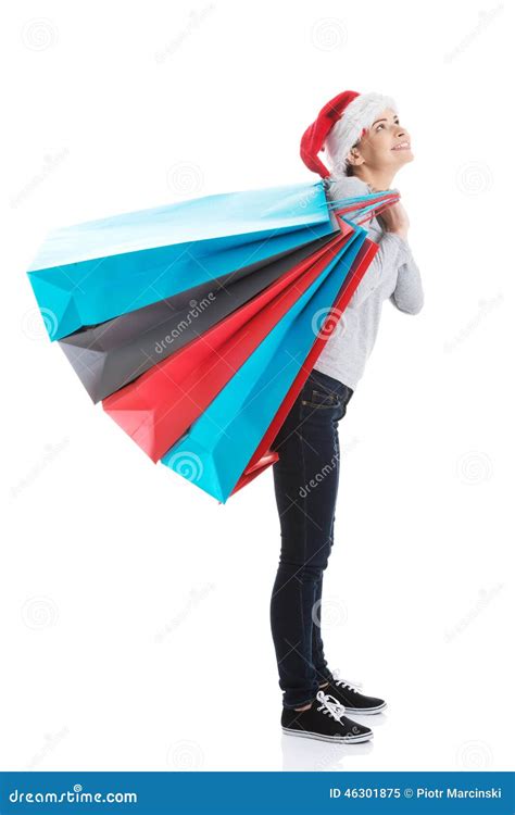 woman carrying sack full  presents stock image image  beauty isolated
