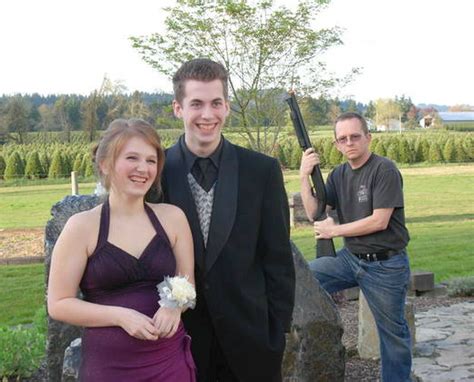 armed fathers posing with their daughter s prom date bossip