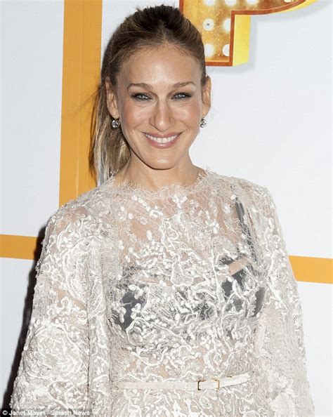 sarah jessica parker displays bra in see through lace dress at opening