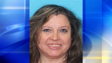 missing 55 year old woman found dead inside car that flipped into