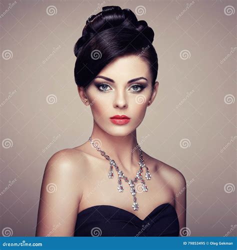 Fashion Portrait Of Young Beautiful Woman With Jewelry Stock Image