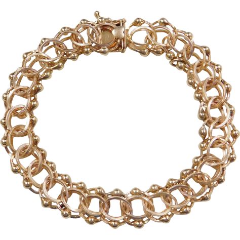 vintage  gold link charm bracelet   grams