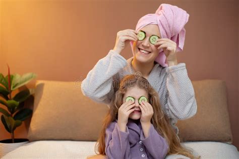 mom  daughter  spa treatments  home stock photo image