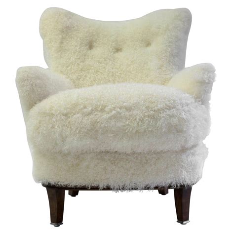 shearling covered shaped  chair  wood base