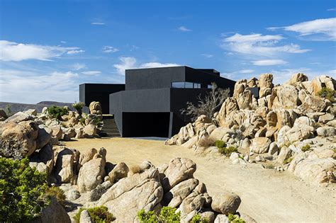modern oasis   middle  yucca valley  black desert house