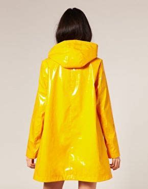 asos asos plastic rainmac  asos yellow rain jacket shiny jacket rain jacket