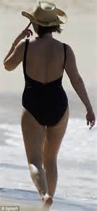 emma forbes shows off her enviable curves in a sexy cutout swimsuit on annual caribbean holiday