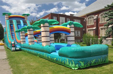 tropical double lane slip   water inflatable jump houses dallas
