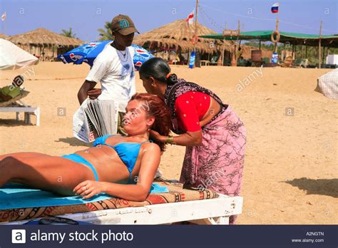 India North Goa A Girl Having A Massage On Candolim Beach