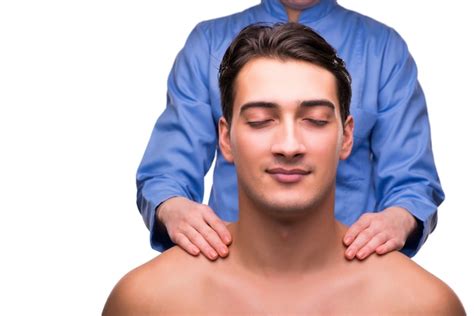 Premium Photo Man During Massage Session Isolated On White