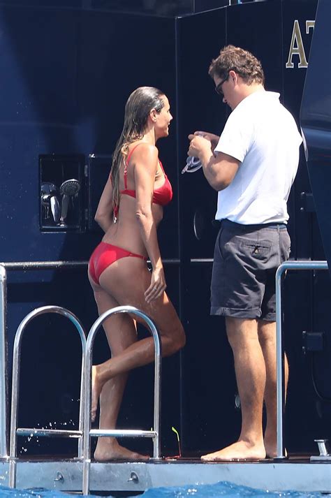 heidi klum wearing a red bikini on a yacht while on holiday in saint