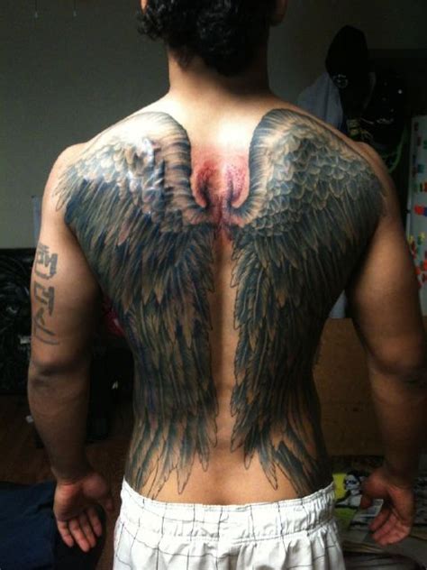 60 Best Angel Tattoos On Back