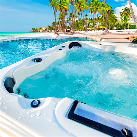 outdoor jacuzzi  shown  palm trees   background  blue