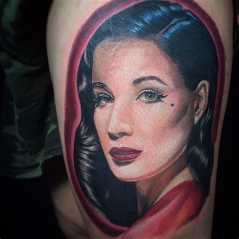 Portrait Style Colored Shoulder Tattoo Of Dita Von Teese Face