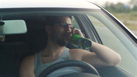 driver drinking beer stock footage sbv 316958087 storyblocks