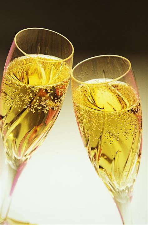 Two Full Champagne Glasses Toasting Stockfreedom Premium Stock