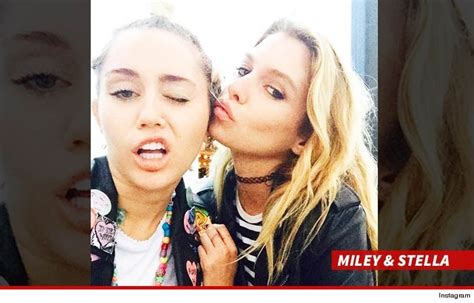 miley cyrus makin out with hot new chick photo video