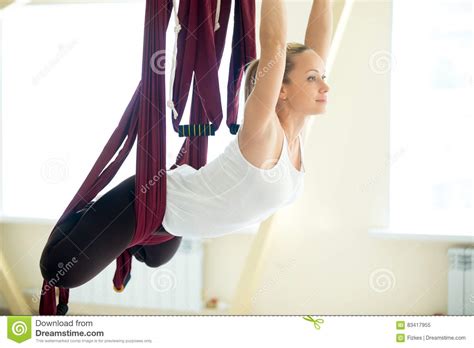 aerial yoga flying  hammock  butterfly pose stock image image