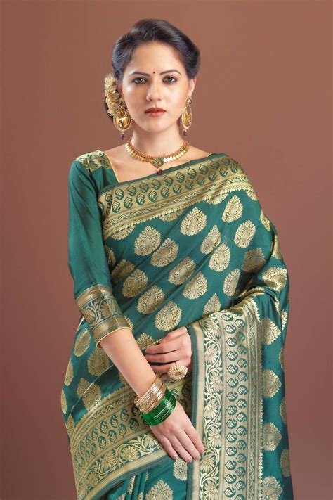 dark green woven kanchipuram art silk saree with blouse bhelpuri