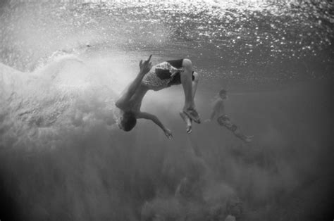 ethereal underwater photography  people  acrobatic poses designtaxicom