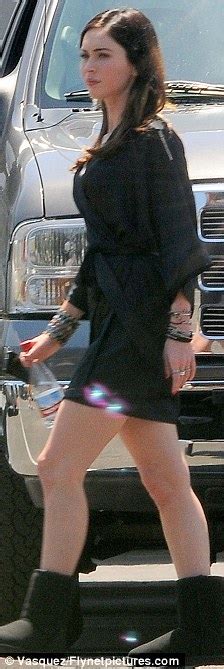 megan fox proudly shows off her newly acquired ample curves in a clingy mini dress daily mail