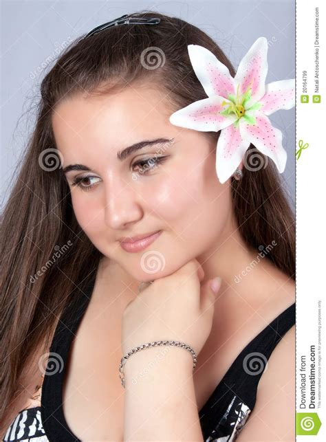 beautiful girl with a flower in hair royalty free stock images image