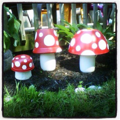 diy garden mushrooms   cups  bowls  dollarama spray painted  glued
