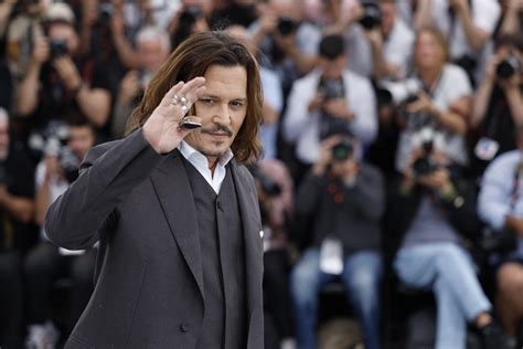 johnny depp i soldi di amber per tributo a paul newman e brando