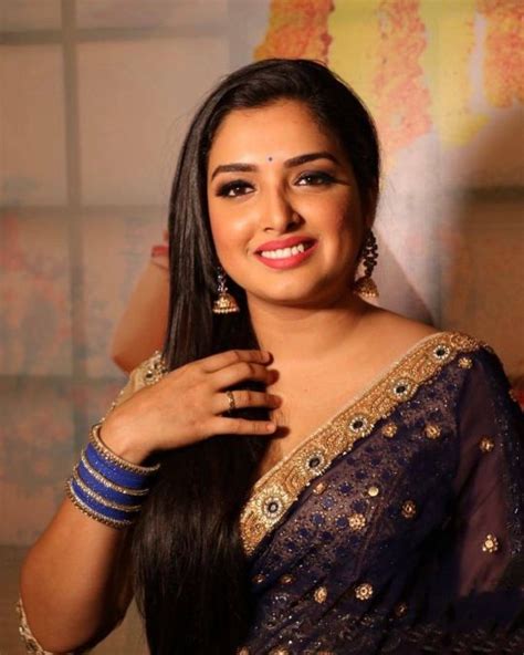 amrapali dubey looks glamorous in blue saree see pictures 1 news track english newstrack