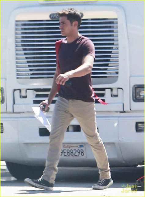 zac efron shows off his buff arms on his way to set photo 720275