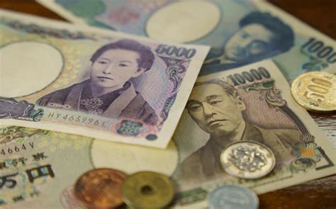 japanese yen falls   year    dollar boosting  troops