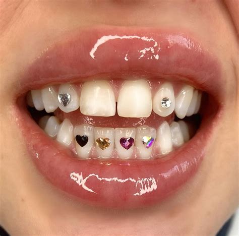 tooth gem designs adding sparkle   smile bang agung