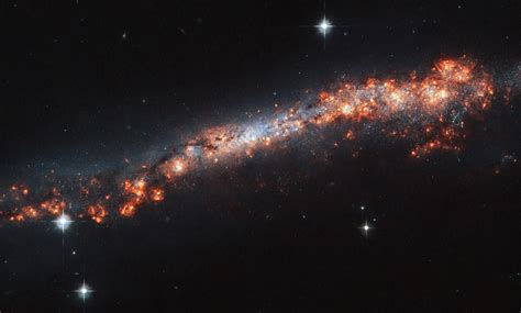 image hubble traces  galaxys outer reaches