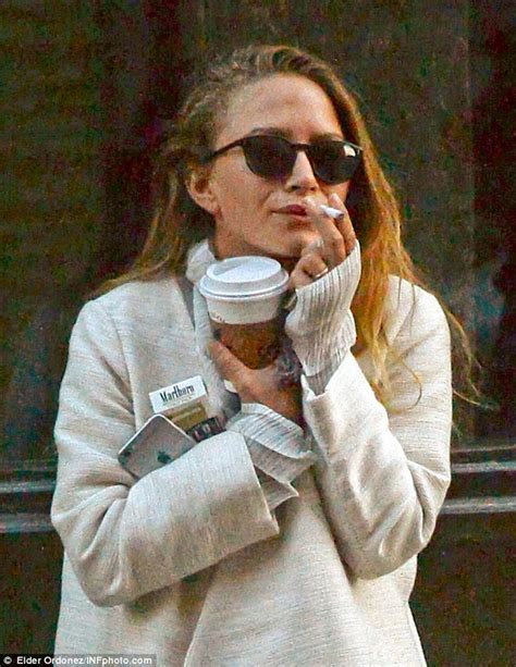 mary kate olsen emerges with twin ashley for first time since her
